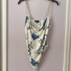 Graphic white bodysuit with chain straps